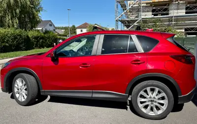 Mazda CX-5 2.2 D Revolution AWD — SUV robuste, équipé 4x4 et pneus hiver inclus — détail