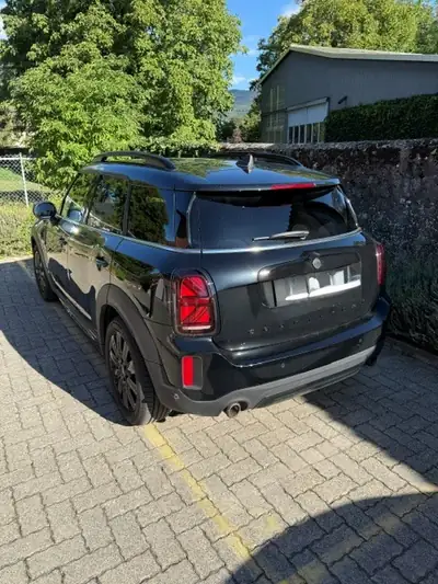 MINI Countryman 2.0i Cooper S ALL4 — SUV compact premium, toutes options, état neuf — fianco
