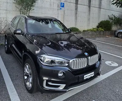 BMW X5 xDrive40d — 7 places, 313 ch diesel, équipement premium complet — fianco