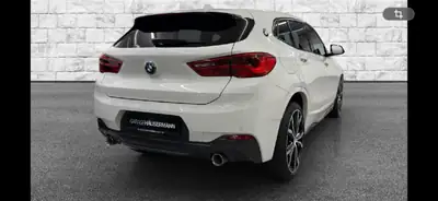 BMW X2 20d xDrive — SUV compact diesel, entretien BMW récent — vista posteriore