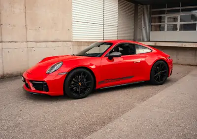 Porsche 911 Carrera T PDK 2024 — Sportivité pure, 49 990 km, garantie constructeur — côté