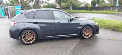 Subaru Impreza 2.5 T WRX STI — Berline sportive emblématique, 300 ch et transmission intégrale — Heckansicht