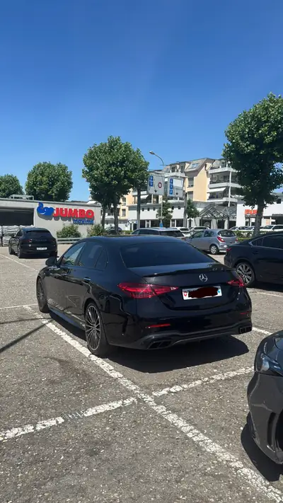 Mercedes-Benz C 300 AMG Line 4Matic — Berline dynamique hybride essence, 51 000 km seulement — side view