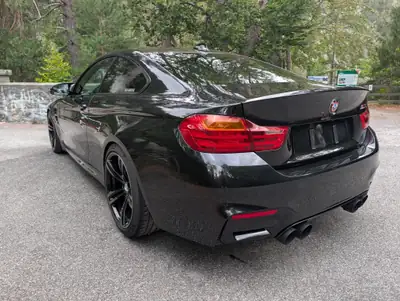 BMW M4 Coupé 2014 — Sportive légendaire, 431 ch, finition premium — vista posteriore