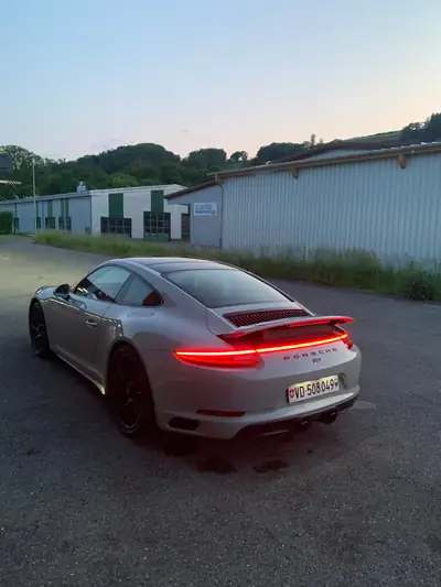 Porsche 911 Carrera 4 GTS — Coupé sportif légendaire, 450 ch et transmission PDK — dettaglio