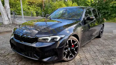 BMW M340i xDrive 48V — Berline sportive hybride légère, quasi neuve avec service gratuit — vista esterna