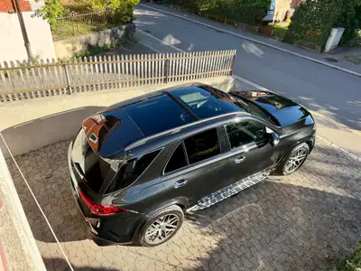 Mercedes-Benz GLE 400 d AMG Line — 7 places, diesel puissant, équipement premium — rear view
