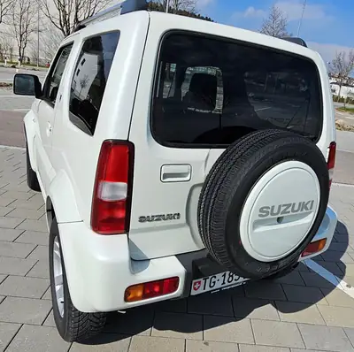 Suzuki Jimny 1.3 4WD GL Top — Petit SUV robuste, 70'000 km, sans sinistre — arrière
