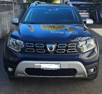 Dacia Duster 1.5 Blue dCi Prestige 4WD — SUV robuste, 4x4 authentique, faible kilométrage — fianco