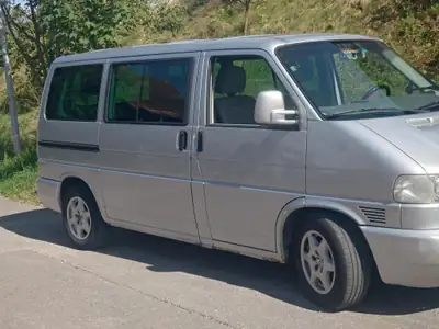VW T4 2.5 TDI 102 — Monospace robuste 7 places, sans accident — rear view