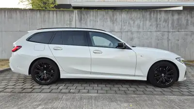 BMW 320d xDrive Touring — Break M-Sport 2022, motorisation efficace et transmission intégrale — fianco