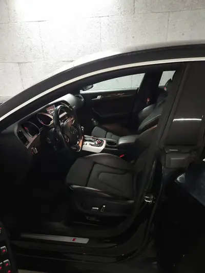 Audi A5 Sportback 2.0 TDI Quattro — Berline élégante, 121'000 km, transmission automatique — fianco