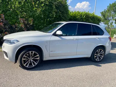BMW X5 40d xDrive — SUV premium diesel, 212 000 km, sans sinistre — side view