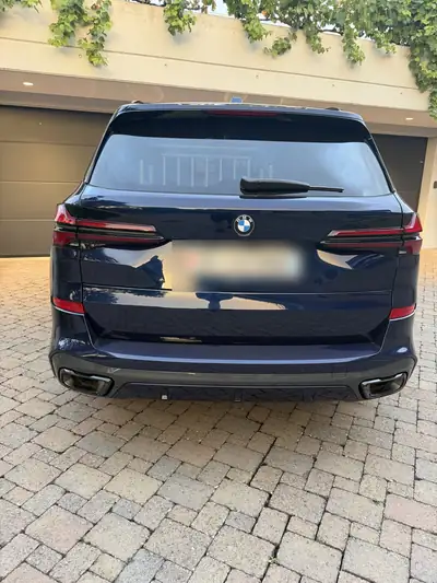 BMW X5 40d xDrive M Sport Pro — SUV premium diesel 2024, 22'000 km seulement — fianco