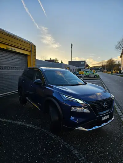 Nissan X-Trail 1.5 VC-T Tekna e-4orce — SUV hybride 7 places, 75 000 km — rear view