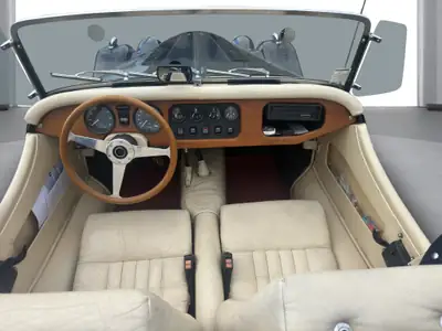 Morgan 4/4 — Cabriolet britannique vintage, faible kilométrage, intérieur beige d'époque — vue extérieure