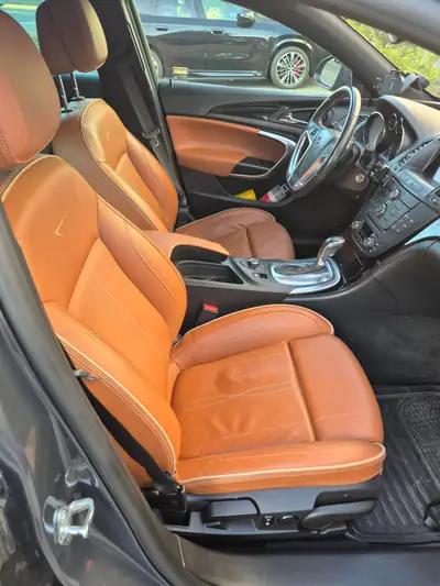 Opel Insignia 2.0 T 4x4 Cosmo — Break spacieux, transmission automatique et traction intégrale — côté