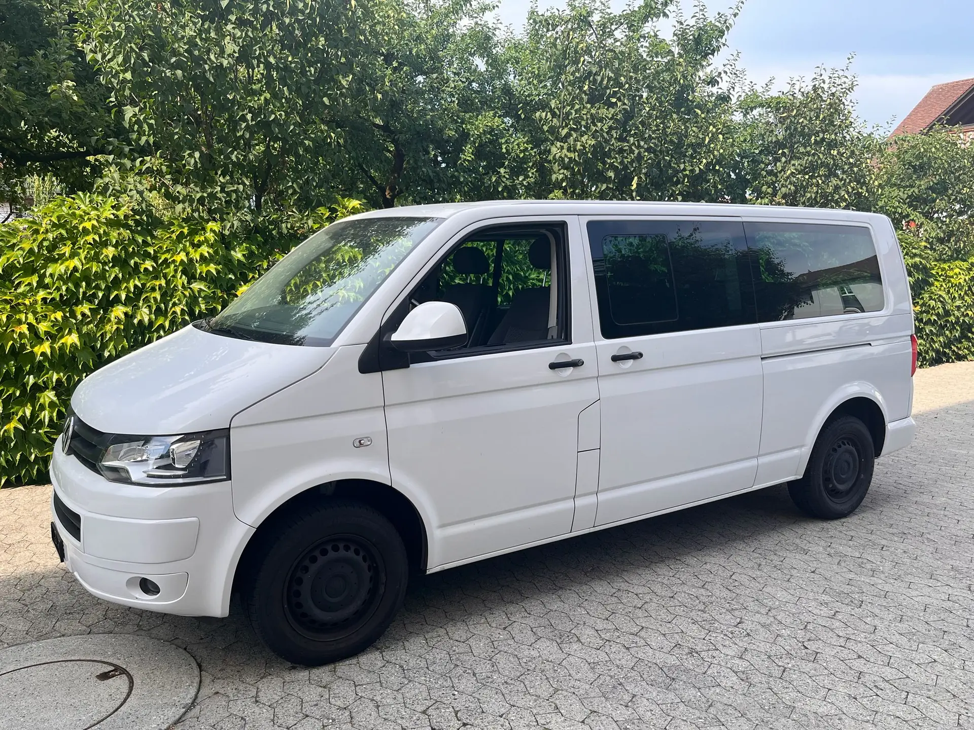 VW T5 Caravelle 2.0 TDI 140 — Van aménageable 7 places, économique et fiable