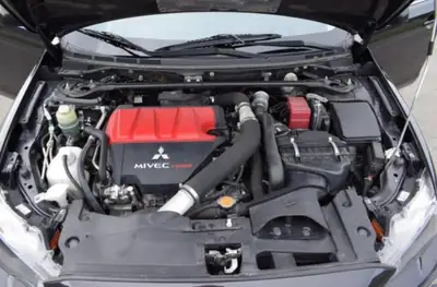 Mitsubishi Lancer Evo 2.0 T MIVEC — Berline sportive 295 ch, transmission intégrale, 64 000 km — Detail