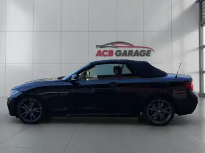 BMW M240i xDrive Cabriolet — Roadster sportif 340 ch, entretien premium à jour — vista posteriore