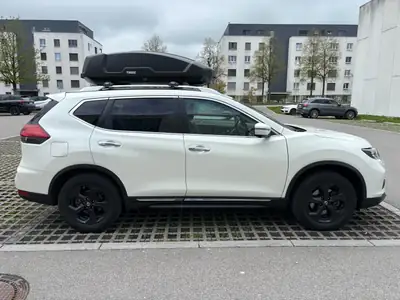 Nissan X-Trail 1.3 DIG-T Tekna — SUV familial 7 places, moteur turbo efficace — côté
