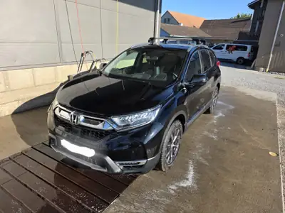 Honda CR-V 1.5 i-VTEC Executive 4WD — SUV fiable 4x4, intérieur premium noir — fianco