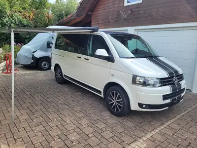 VW T5 Multivan ED25 — Camping-car familial 7 places avec équipements premium — Außenansicht