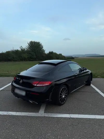 Mercedes-Benz C 200 AMG Line Coupé 4MATIC — Élégance sportive et technologie premium — rear view