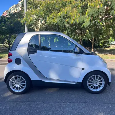 Smart Fortwo 1000 84 Passion — Citadine maligne, parfaite pour la ville — côté
