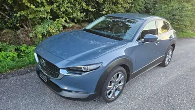 MAZDA CX-30 2.0 122 Revolution AWD — SUV compact hybride mild, 51'000 km seulement — Seitenansicht