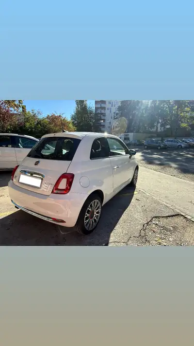 Fiat 500 1.0 Hybrid Red 2022 — Citadine maligne à faible consommation — côté