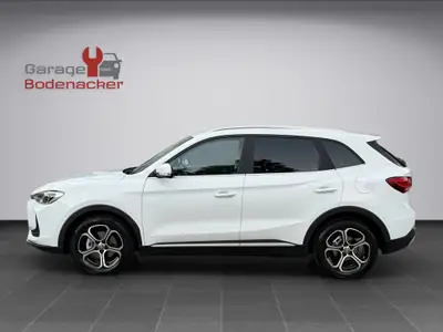 MG ZS 1.5 HEV Comfort 2025 — SUV hybride économique, seulement 3300 km — vista posteriore