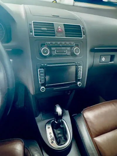 VW Touran 1.4 TSI 140 Highline DSG — Monospace familial 7 places, fiable et économe — Innenraum