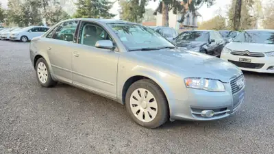 Audi A4 Limousine 2.0 Turbo FSI — Berline élégante, boîte automatique, 200 ch — fianco