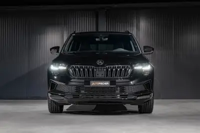 Skoda Karoq 1.5 TSI SportLine DSG — SUV compact dynamique, quasi neuf avec garantie constructeur — Heckansicht