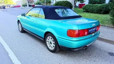 Audi Cabriolet 2.8 E — Roadster élégant des années 90, moteur V6 performant — tableau de bord