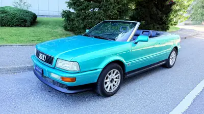 Audi Cabriolet 2.8 E — Roadster élégant des années 90, moteur V6 performant — Miniature 13