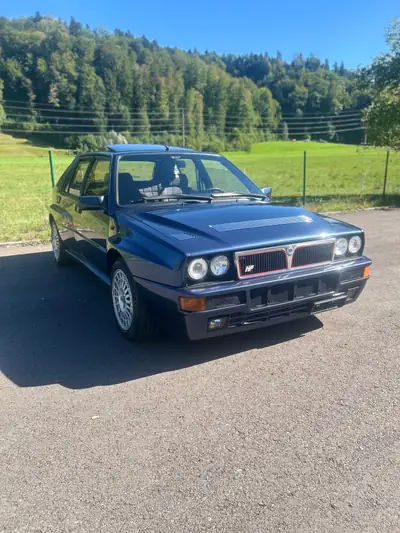 Lancia Delta HF Integrale 1992 — Légende du rallye, moteur 2.0L turbo 177 ch — côté