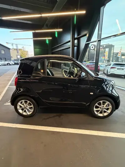 Smart Fortwo 1.0 71 Passion — Citadine compacte, économe et sans sinistre — Seitenansicht