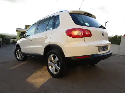 VW Tiguan 2.0 TSI 200 Sport & Style — SUV polyvalent, 120'000 km, transmission automatique — rear view