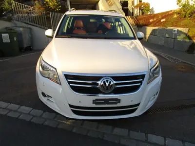 VW Tiguan 2.0 TSI 200 Sport & Style — SUV polyvalent, 120'000 km, transmission automatique — side view