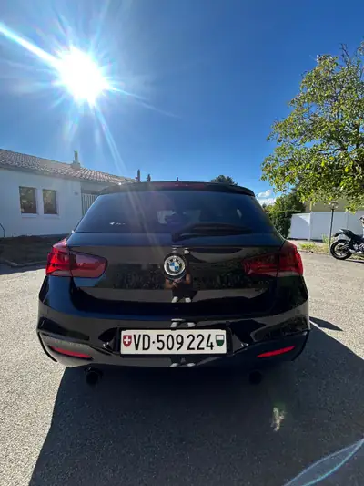 BMW M140i xDrive 2018 — Berline sportive 340 ch, transmission automatique, historique sans sinistre — côté