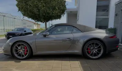 Porsche 911 Carrera S Cabriolet — Roadster de prestige 400 ch, traction arrière authentique — fianco