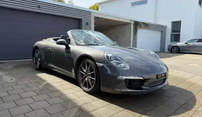 Porsche 911 Carrera S Cabriolet — Roadster de prestige 400 ch, traction arrière authentique — interni