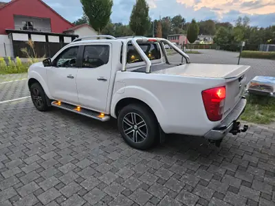 Nissan Navara 2.3 dCi Double Cab Tekna — Pick-up polyvalent 4x4, première main techniien Nissan — side view