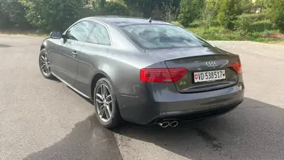Audi A5 2.0 TDI 190 quattro — Coupé sportif diesel, pneus hiver inclus — côté