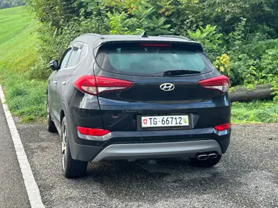 Hyundai Tucson 2.0 CRDi 185 Vertex 4WD — SUV robuste, toit panoramique, sans sinistre — fianco