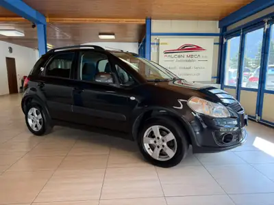 Suzuki SX4 1.6 GL Top 4WD — SUV compact fiable, transmission manuelle, sans sinistre — side view