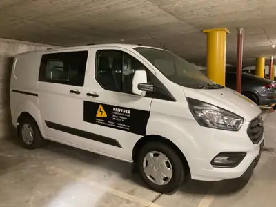 Ford Transit Custom 2.0 TDCi 130 — Utilitaire polyvalent avec aménagement Sortimo, très faible kilométrage — exterior view