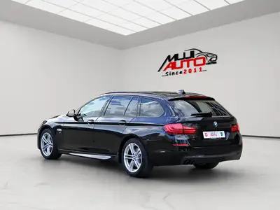 BMW 530d Touring xDrive Platinum Sport Edition — Monospace diesel familial, 141'000 km, suspension abaissée — Heckansicht
